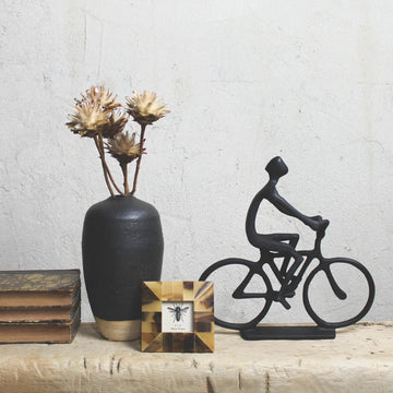 Matte Black Man On Bike